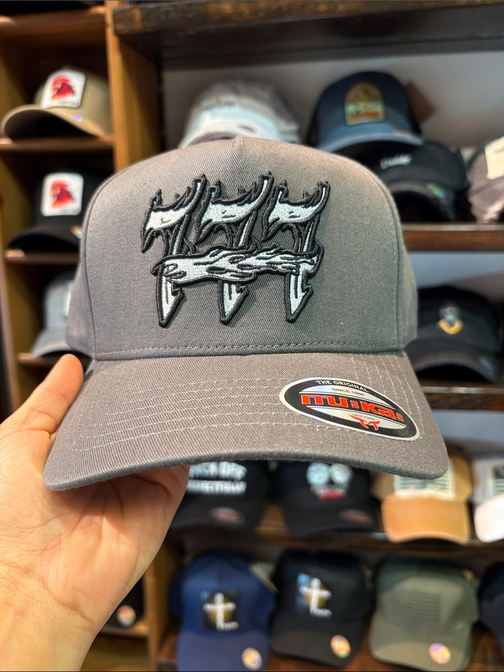 Gray Trucker Hat with Embroidered Fish Logo